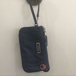 Tumi Voyageur Navy Wristlet. Triple compartment